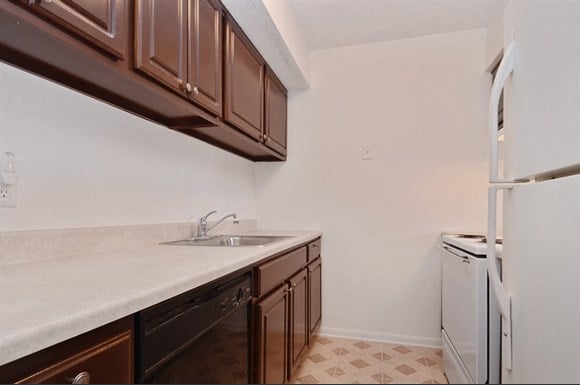 Apartments at Pangea Vineyards offer appliances and updated cabinetry in the kitchen.